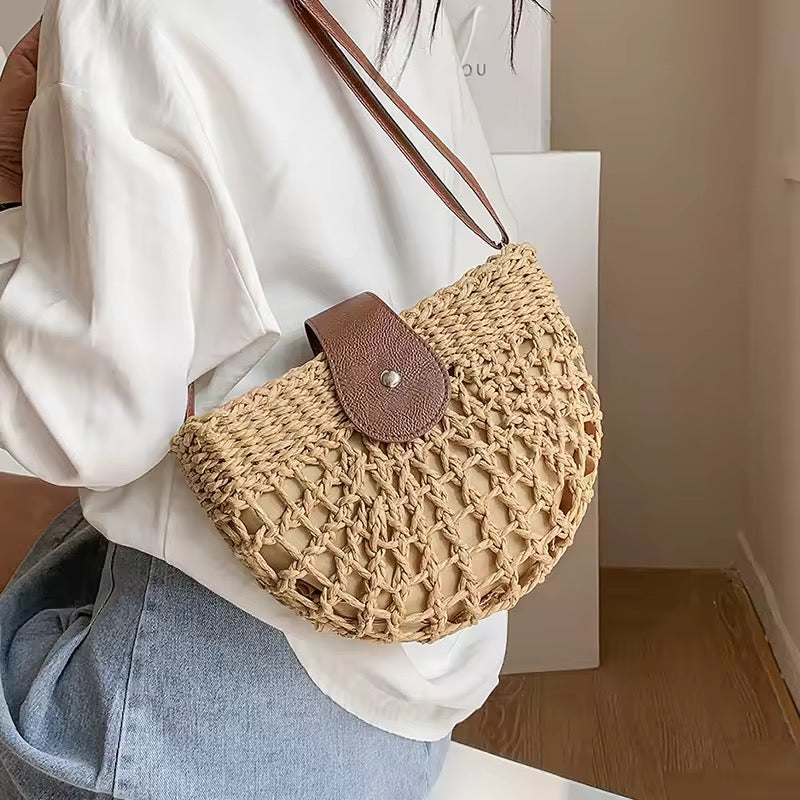 Half-Moon Woven Straw Crossbody Bag with Brown Leather Strap